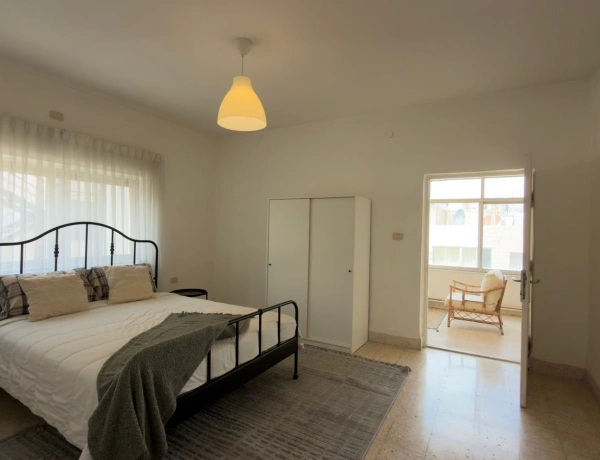 Charming Two-Bedroom Apartment with Two Balconies in Jabal Al Weibdeh | Prime Amman Living