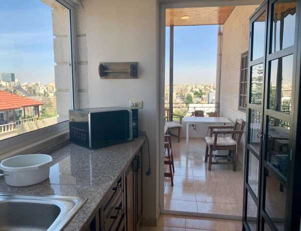 90 sqm Top Floor 2-Bedroom Apartment with Rooftop Access & Panoramic Views