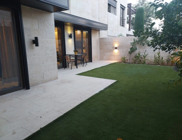 1-Bedroom Apartment for Rent in Abdoun | Private Garden | Near Blue Fig