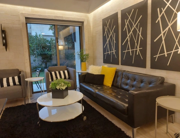 1-Bedroom Apartment for Rent in Abdoun | Private Garden | Near Blue Fig