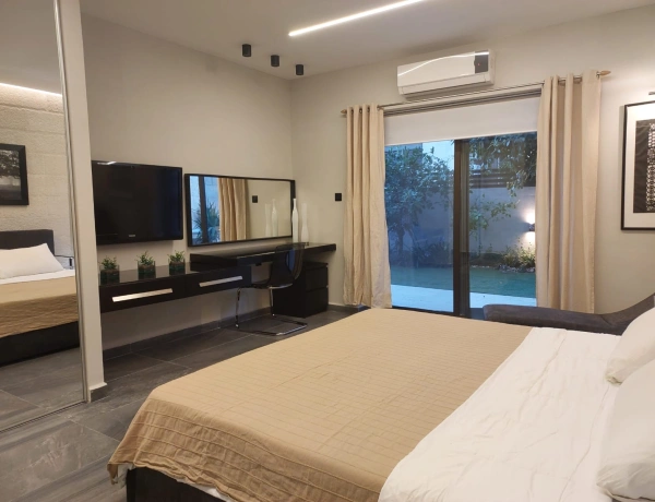 1-Bedroom Apartment for Rent in Abdoun | Private Garden | Near Blue Fig