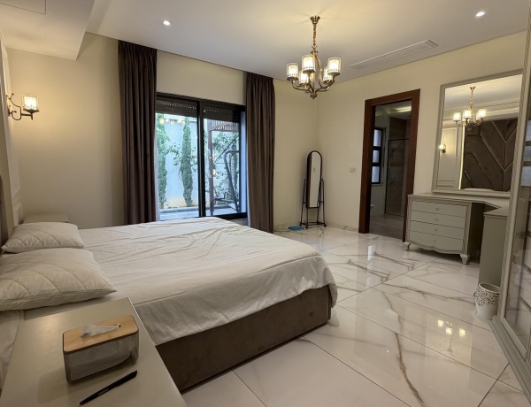 Luxury Three-Bedroom Apartment with Private Terrace for Rent in Abdoun, Amman