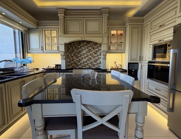 Luxury Three-Bedroom Apartment with Private Terrace for Rent in Abdoun, Amman